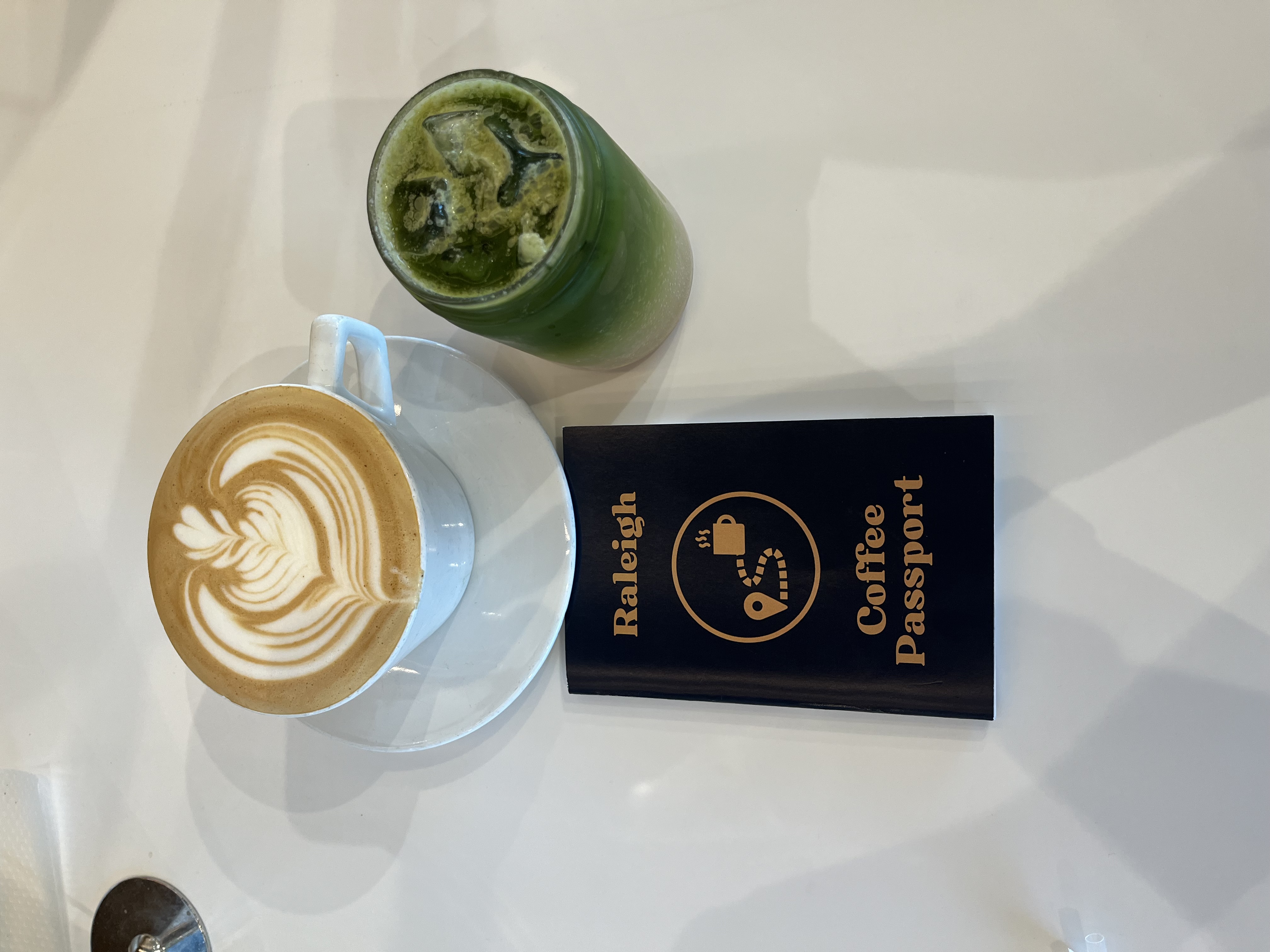 Raleigh Coffee Passport and a two drinks
