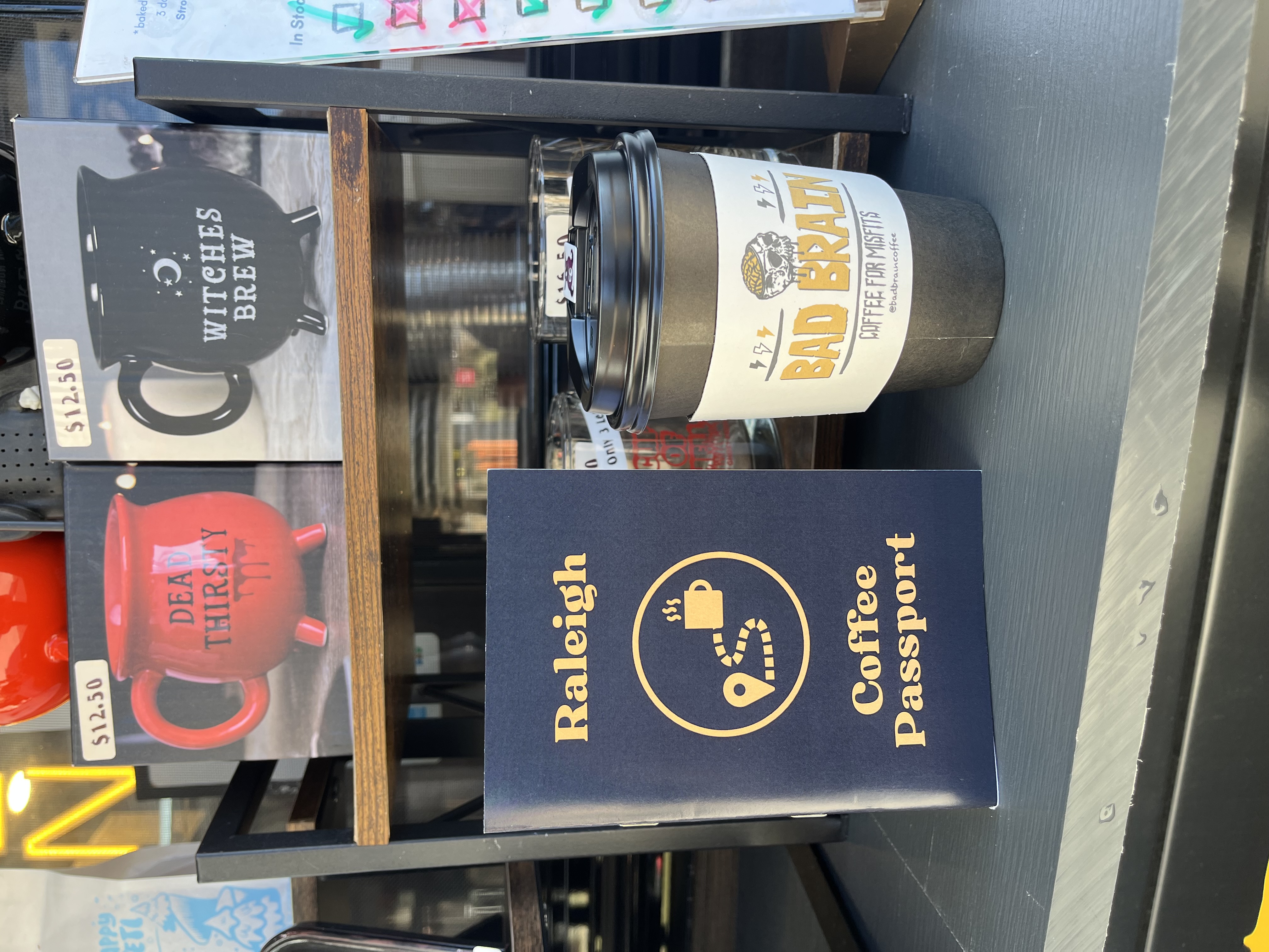 Raleigh Coffee Passport and a drink