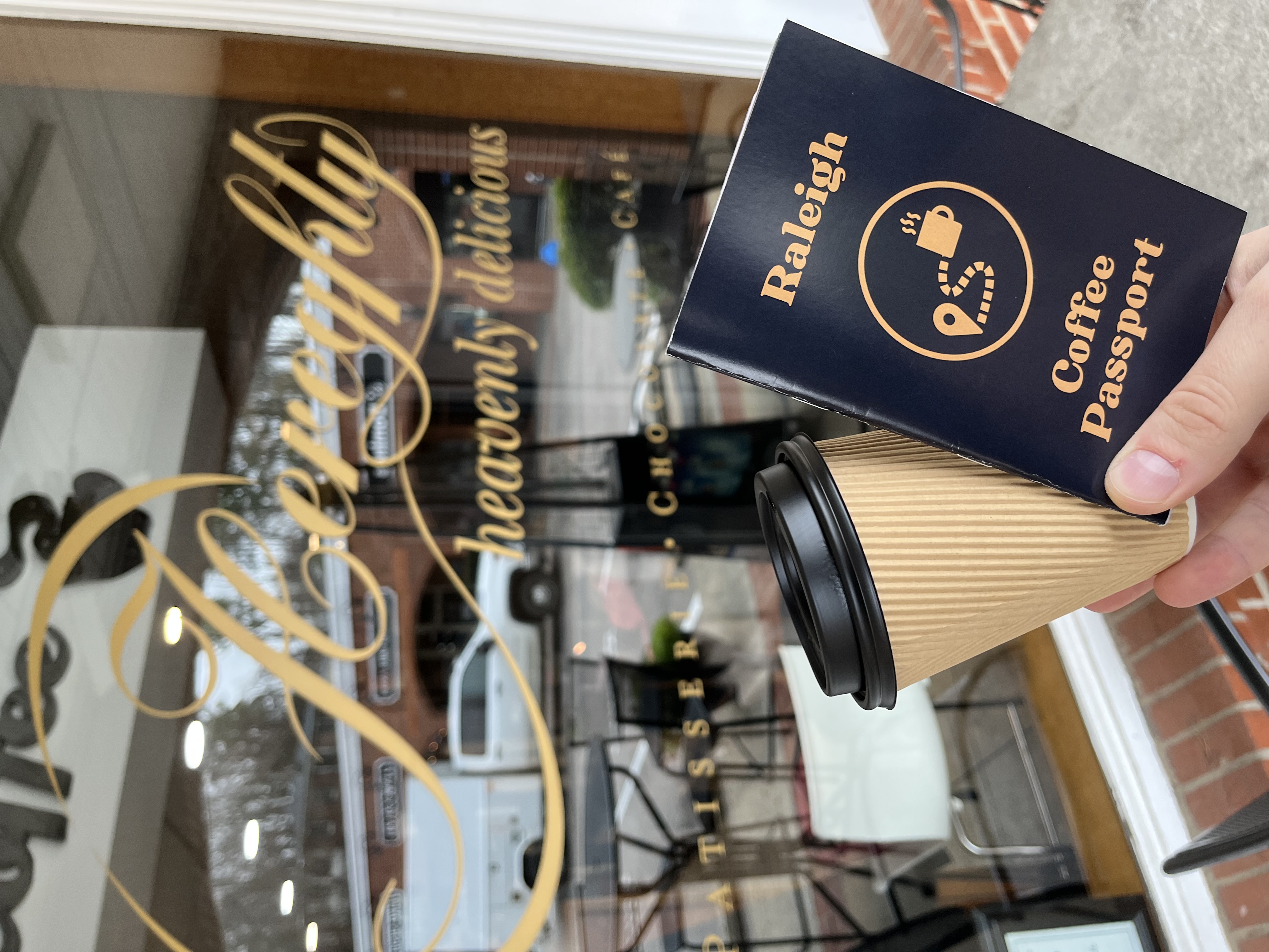 Raleigh Coffee Passport and a drink