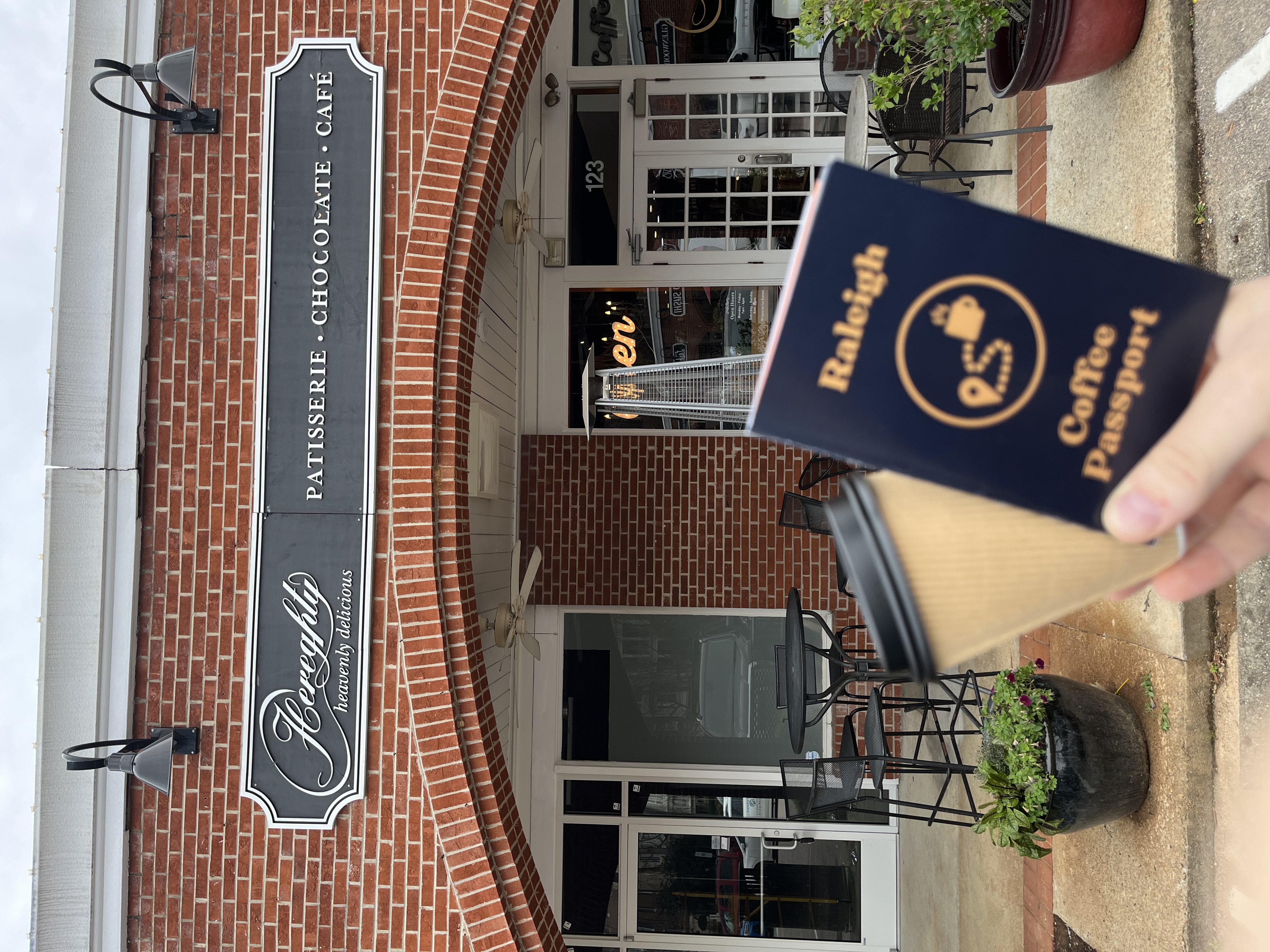 Raleigh Coffee Passport and a drink